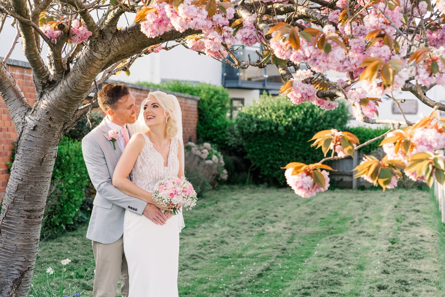 Spring wedding pink cherry blossom pink roses hampshire coast