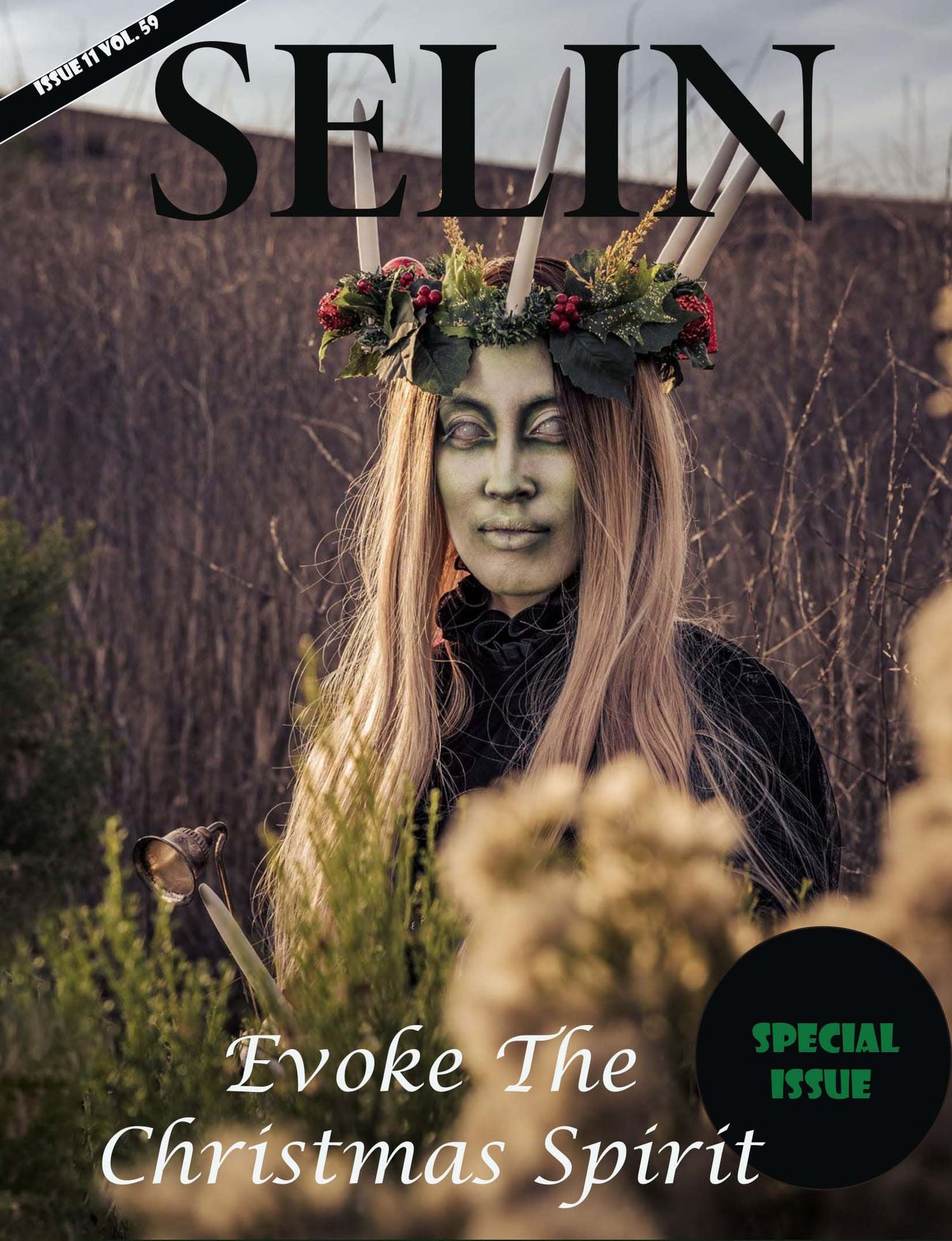 Fantasy-inspired model with antlers and holly crown poses for winter magazine cover. Captured by Chris Cornish Photography.
