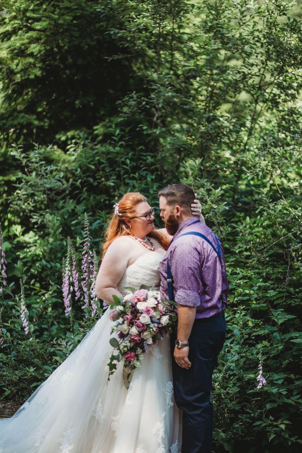 Bride and groom embrace at their private first look