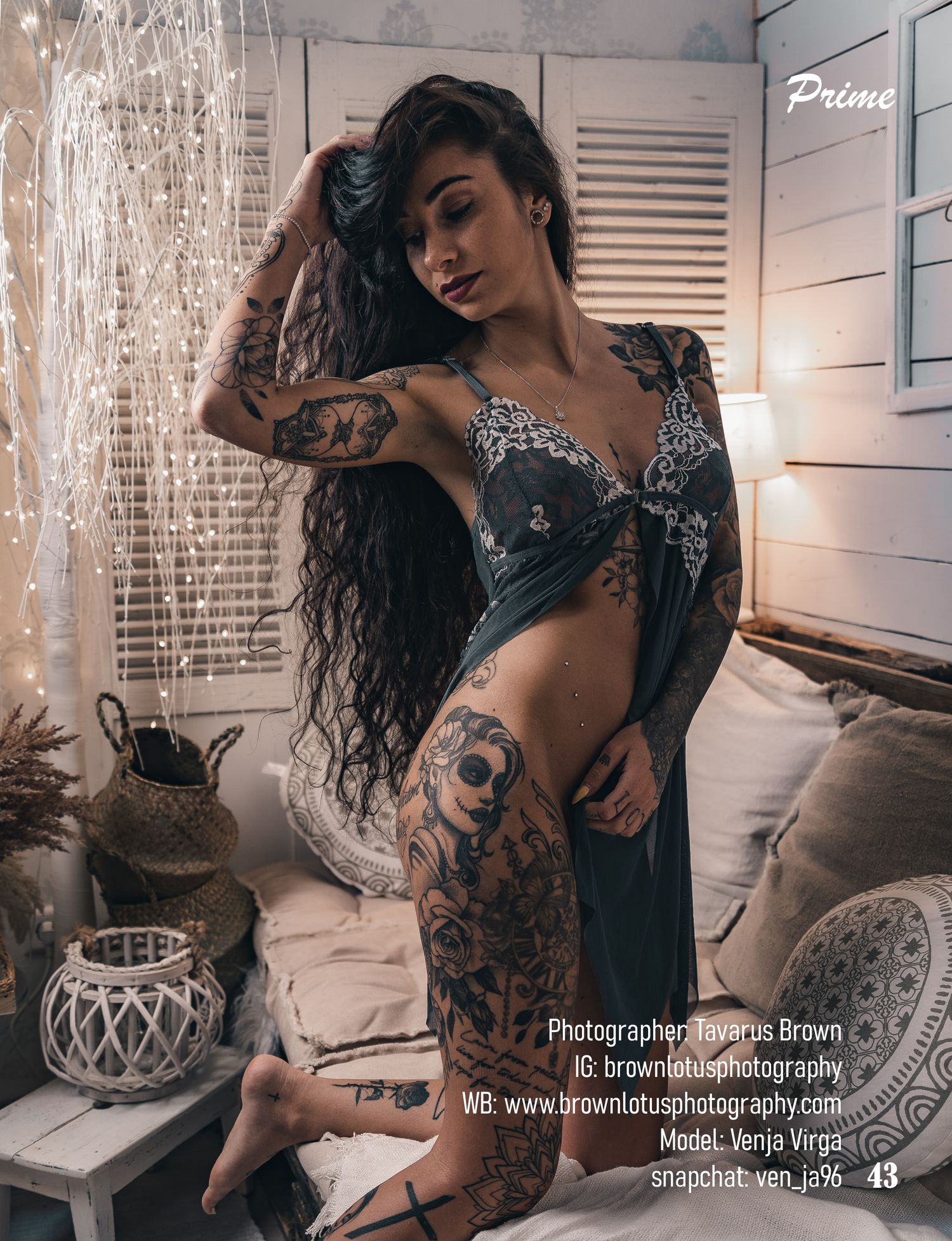 Intimate boudoir portrait in dark lingerie with moody lighting.
