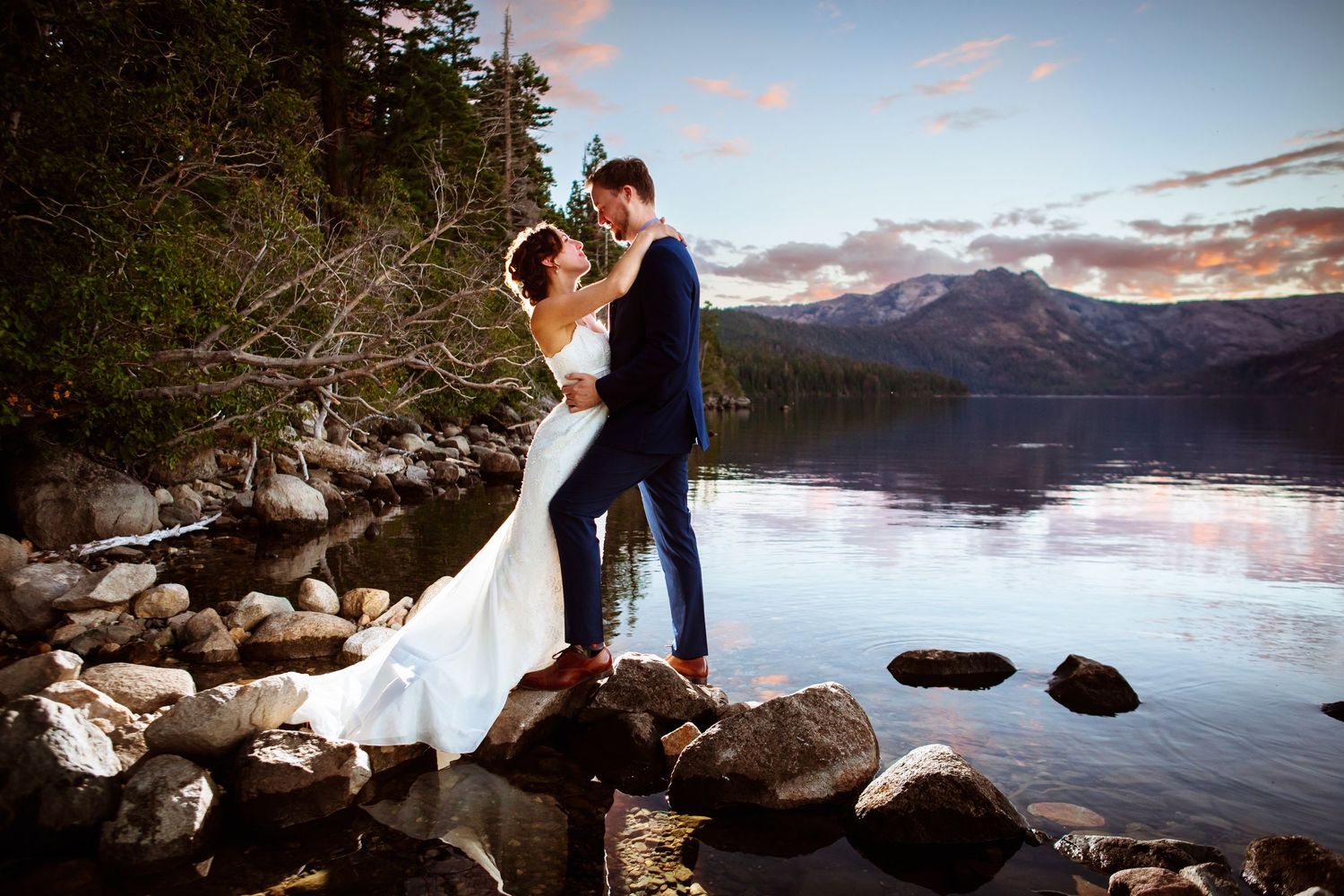 bride and groom embrace at fallen leaf lake elopement