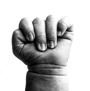Black and white pencil drawing of a clenched fist with detailed shading showing creases and fingernails.
Rashinphotography-Nova DMV DC