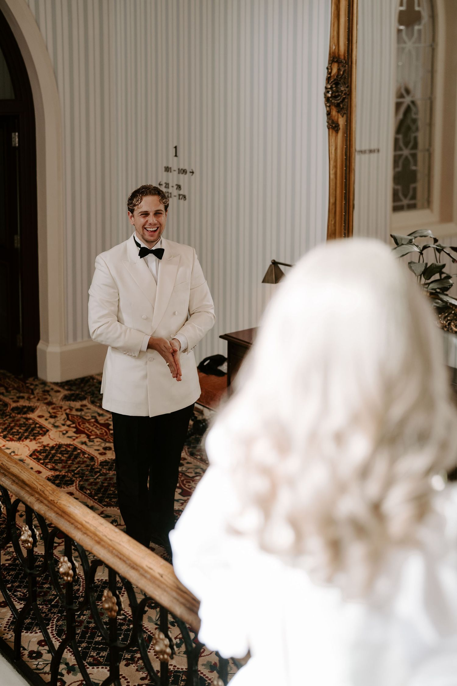 groom seeing bride for the first time in wedding dress at the Randolph hotel in oxford