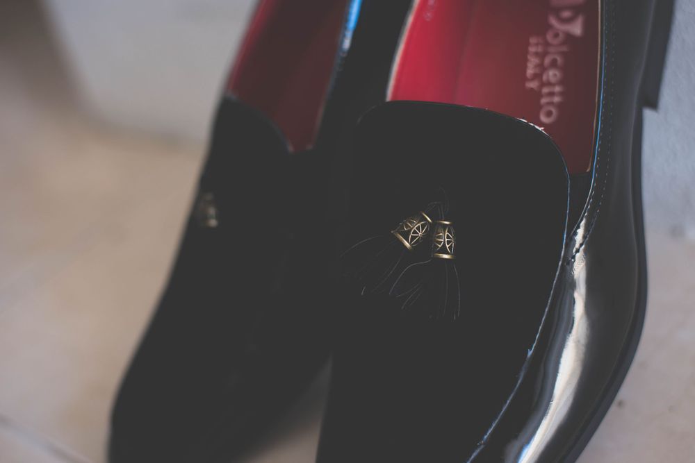 Series of abstract close-up shots showing red and black surfaces with dramatic lighting.