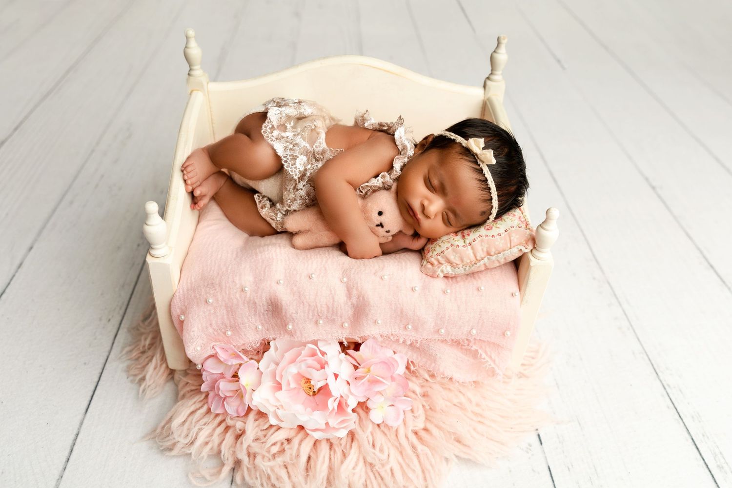 Newborn sleeping on bed. Newborn session. New Hampshire Newborn Photographer