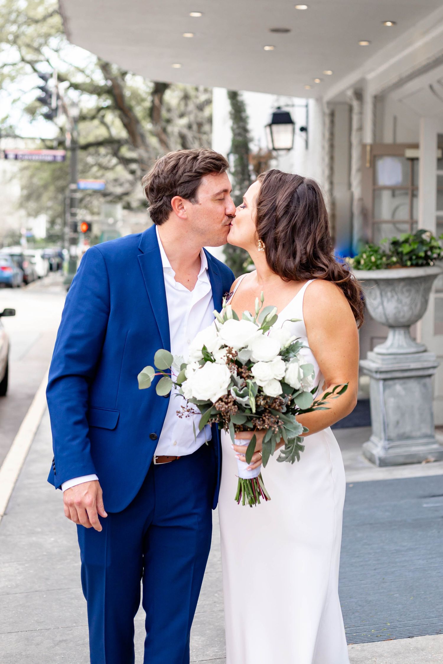 bride and groom kiss from destination wedding photographers
