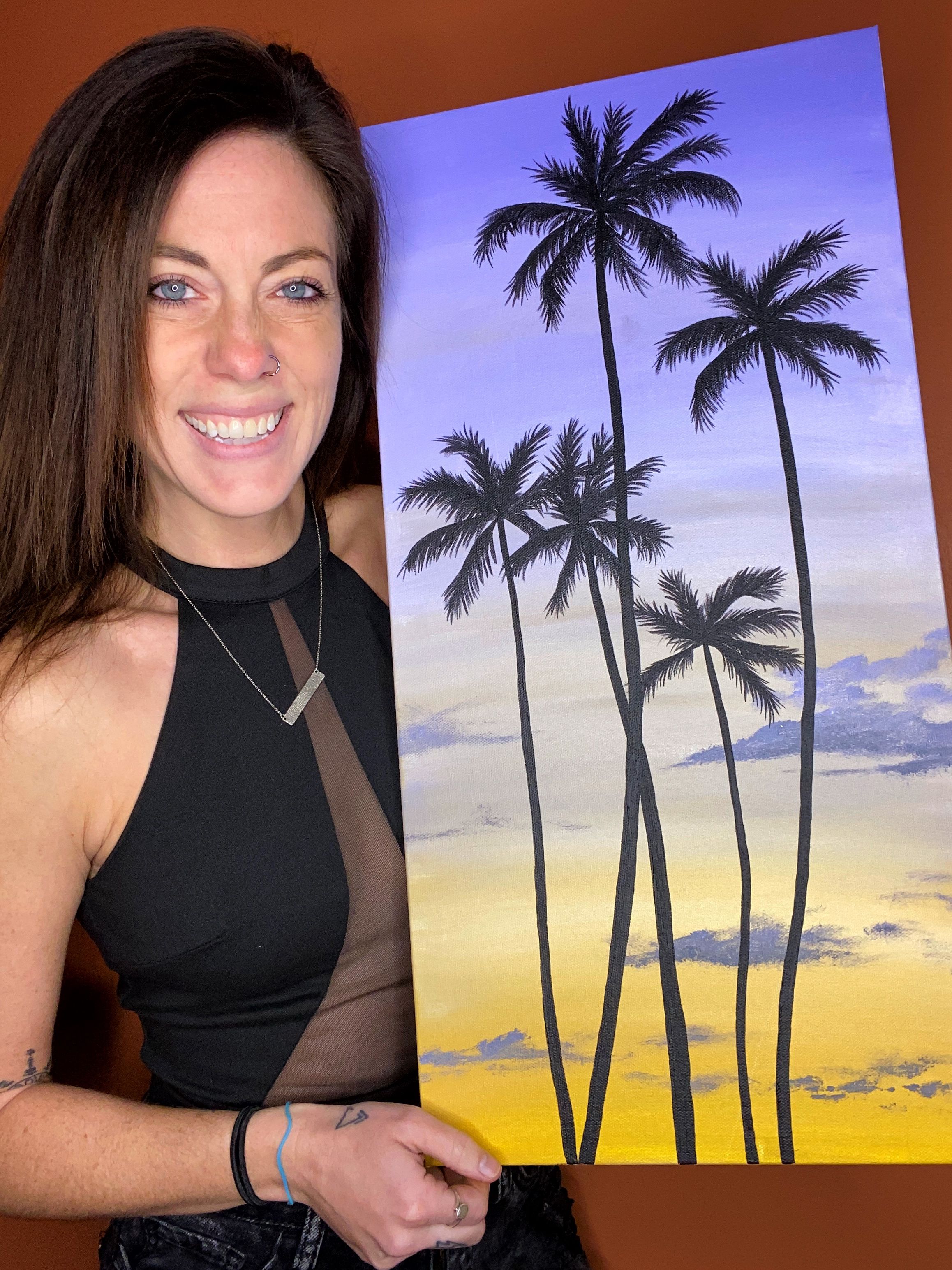 A colorful painting of palm trees silhouetted against a purple and yellow sunset sky.