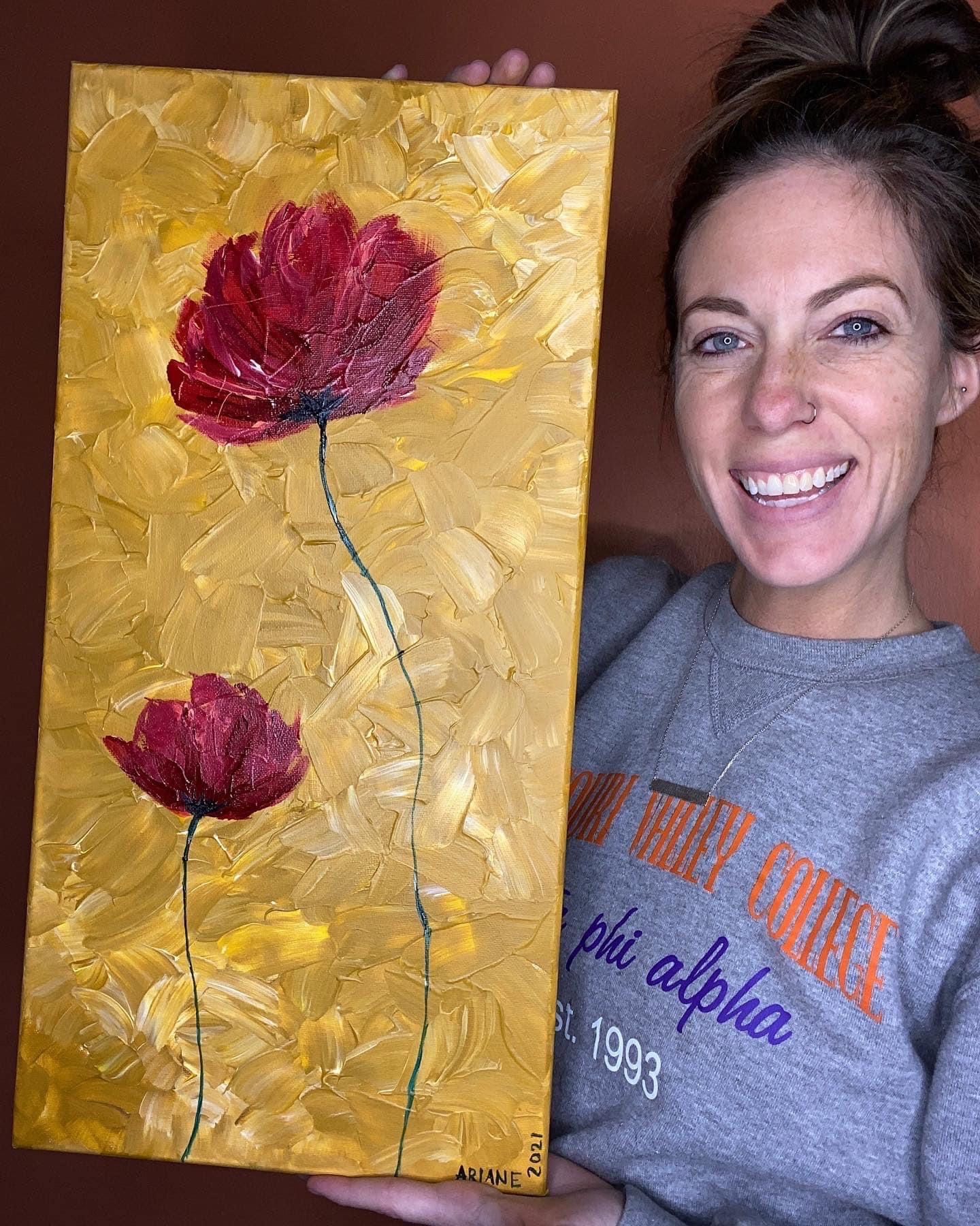 Red poppies painted on textured gold canvas with metallic finish.
