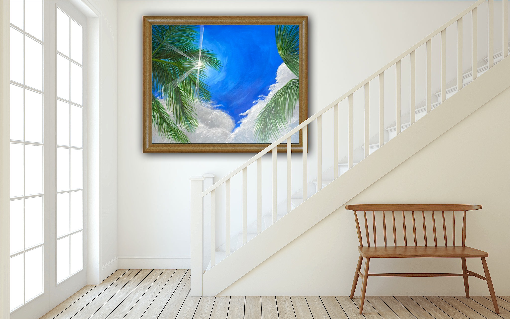 A tropical beach painting in a wooden frame displayed on a white staircase wall.