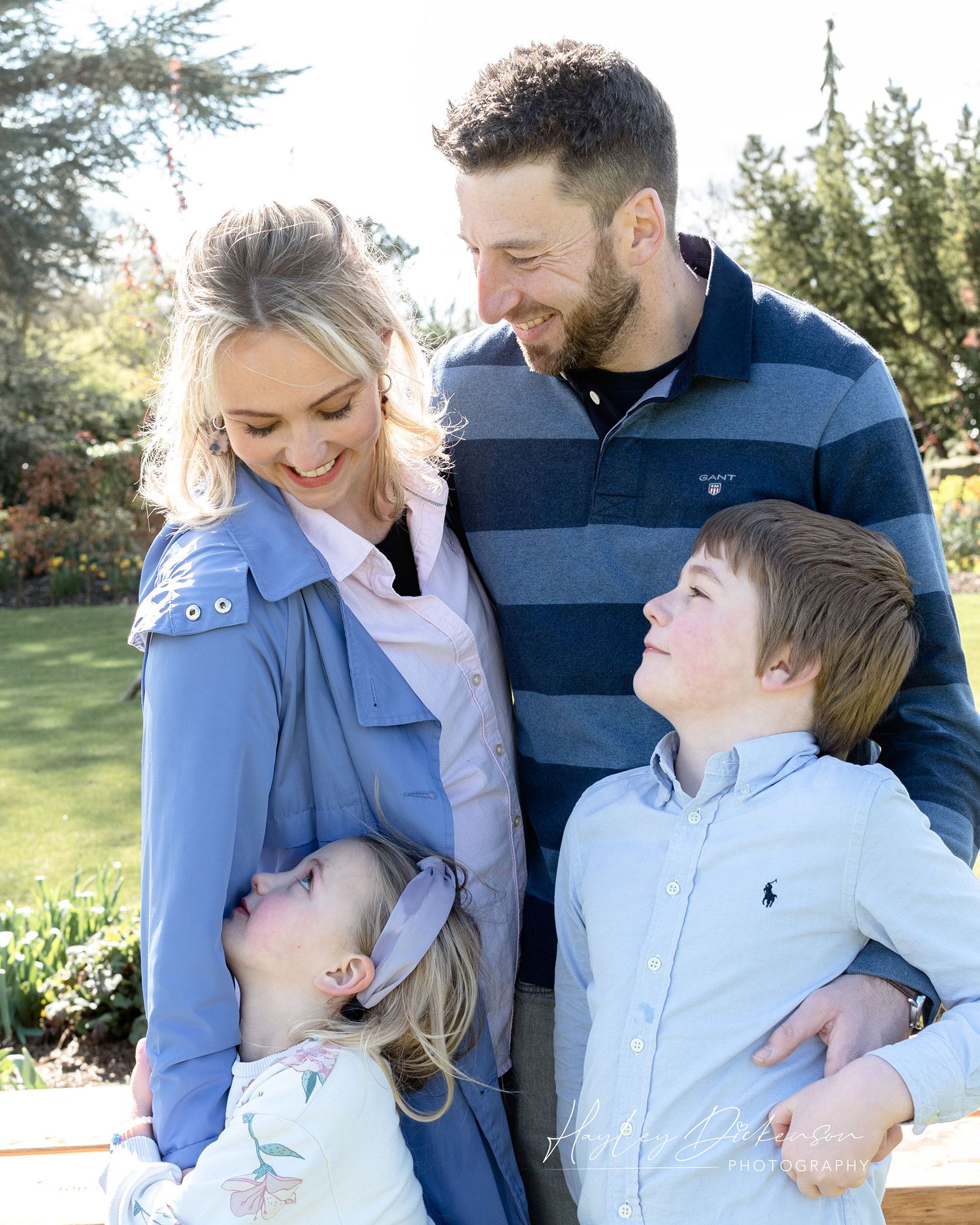 Hayley Dickenson Photography Studio - family of 4 on location all smiling at each other
