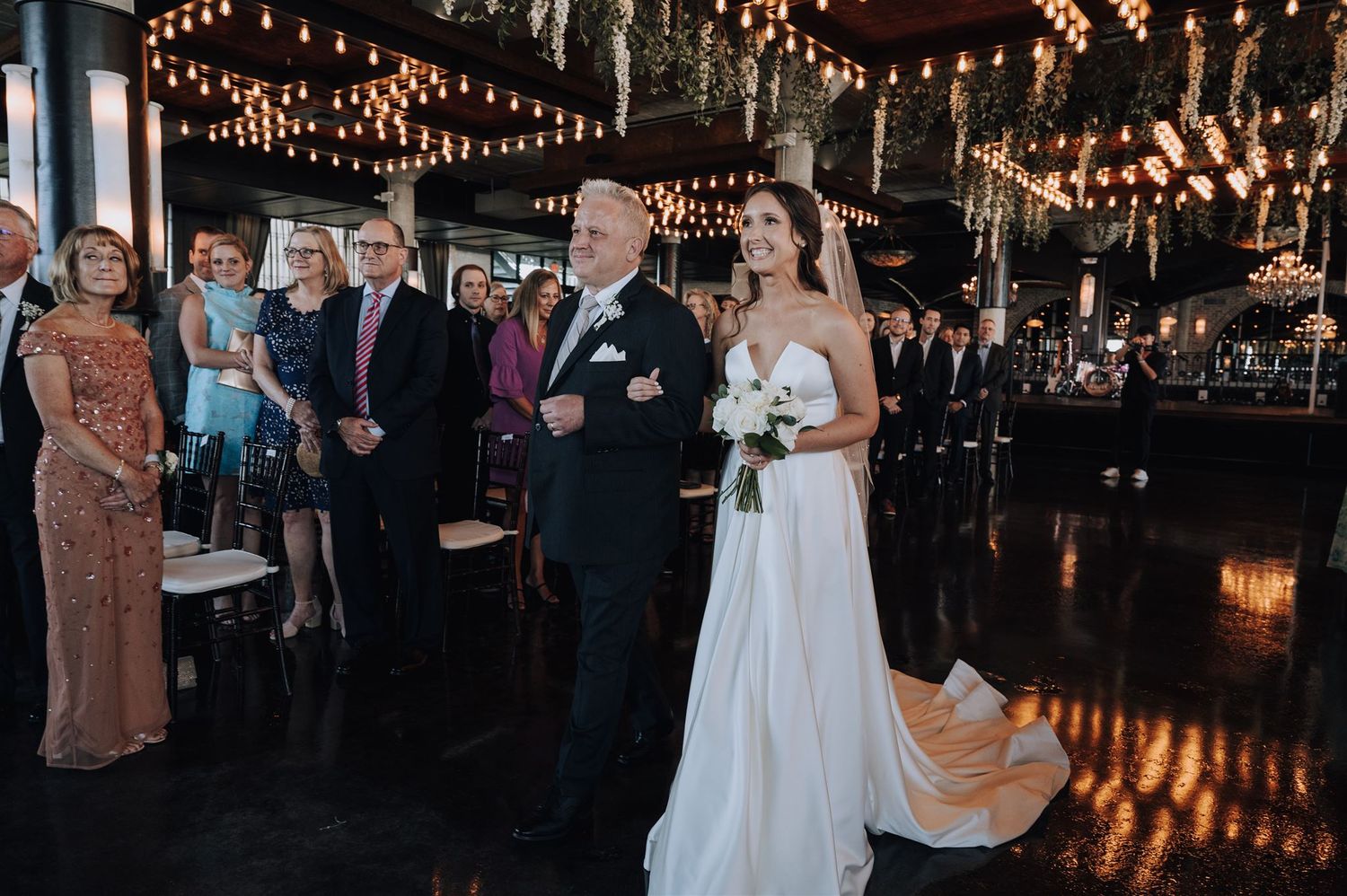 Modern wedding at The Astorian in Houston, Tx. Brides dress is from Anna Be Bridal.
