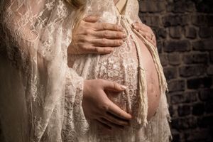 maternity session with lhandmade lace gown