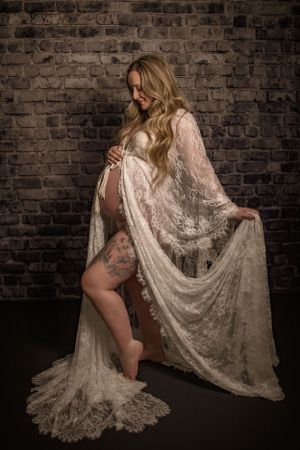 maternity session with lhandmade lace gown