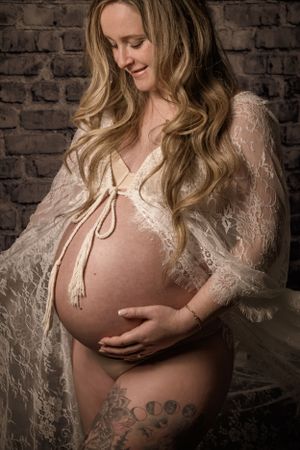 maternity session with lhandmade lace gown