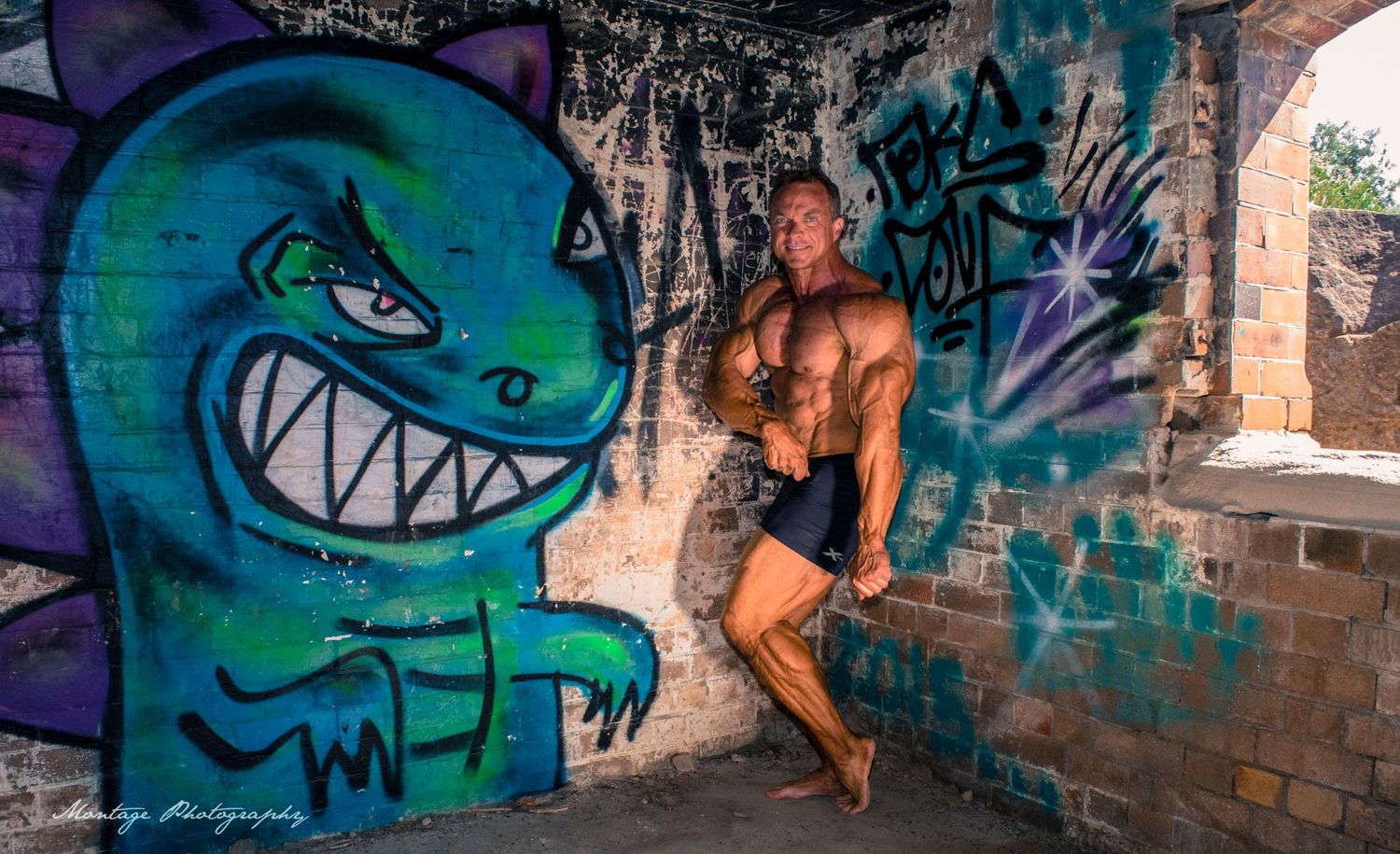 Athletic figure in dynamic pose next to whimsical monster graffiti artwork.