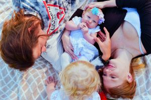 A collection of intimate family portraits showing affectionate moments and smiles.