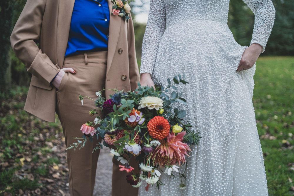 brides wedding outfits and gorgeous bouquet