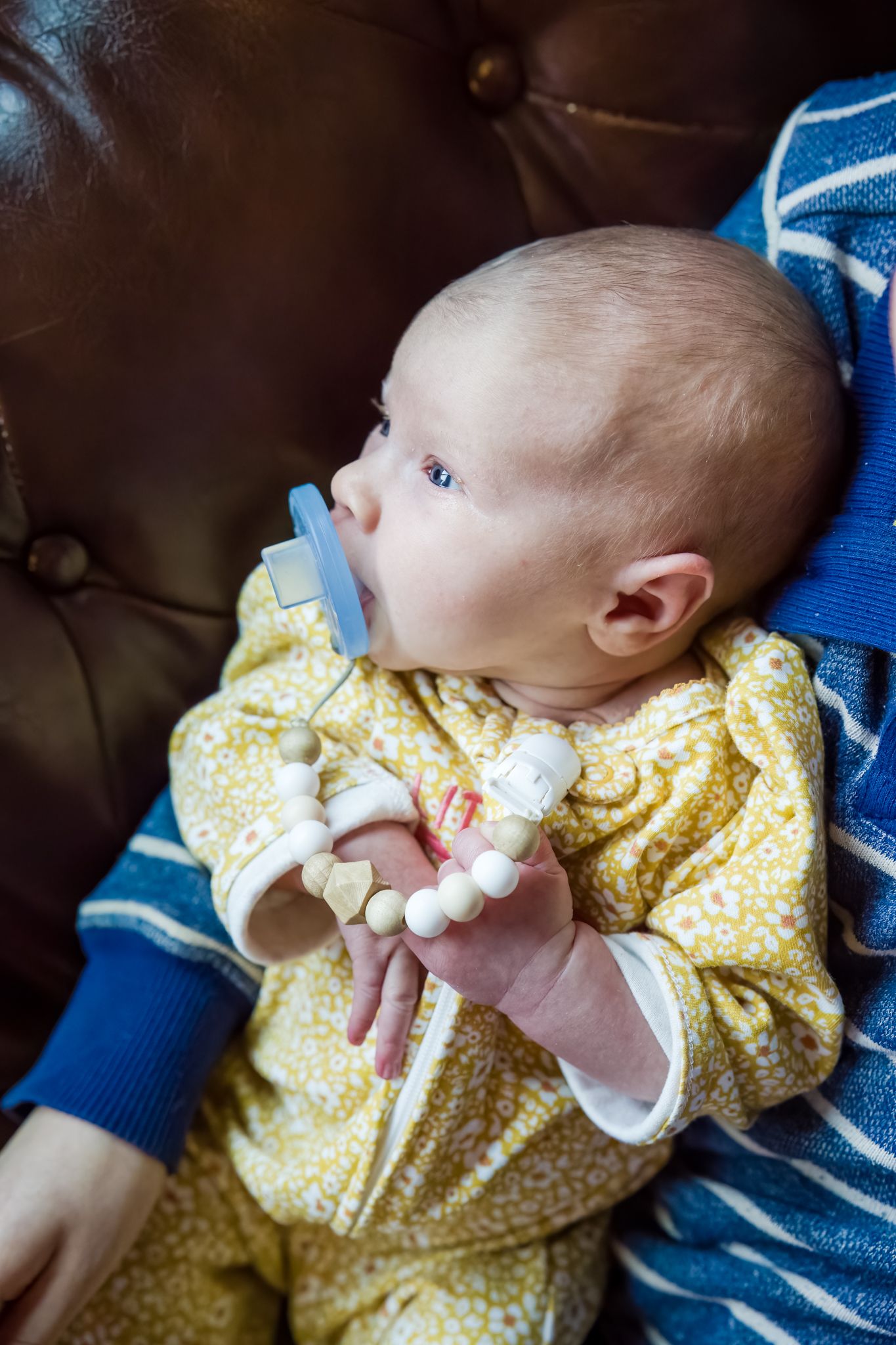 newborn girl being held