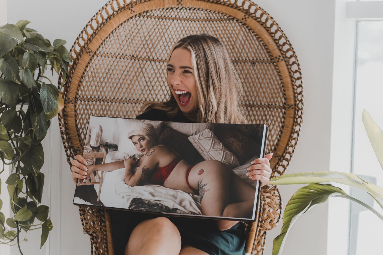 HaeBae Holistics showing off a Luxury Boudoir Album. Barrie Boudoir Photography