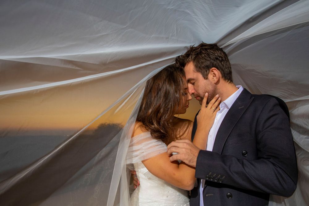 Romantic couple photography session at sunset in Dubai desert