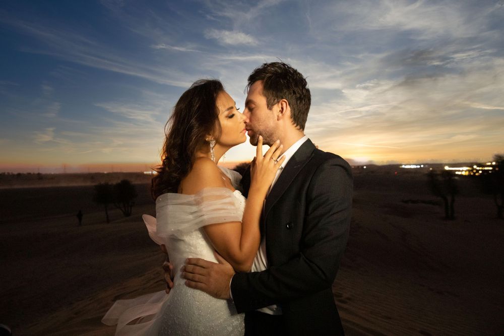 Romantic couple photography session at sunset in Dubai desert