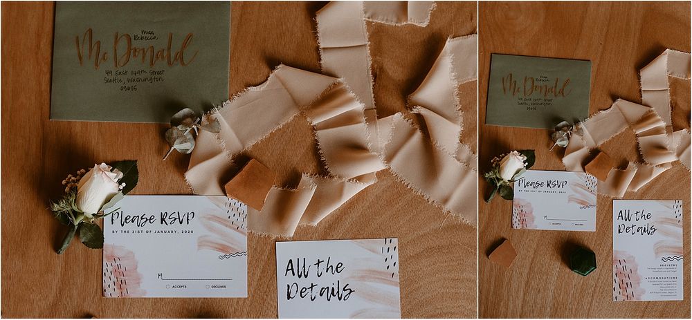Flat lay of wedding stationery and RSVP cards with silk ribbons on wooden surface.