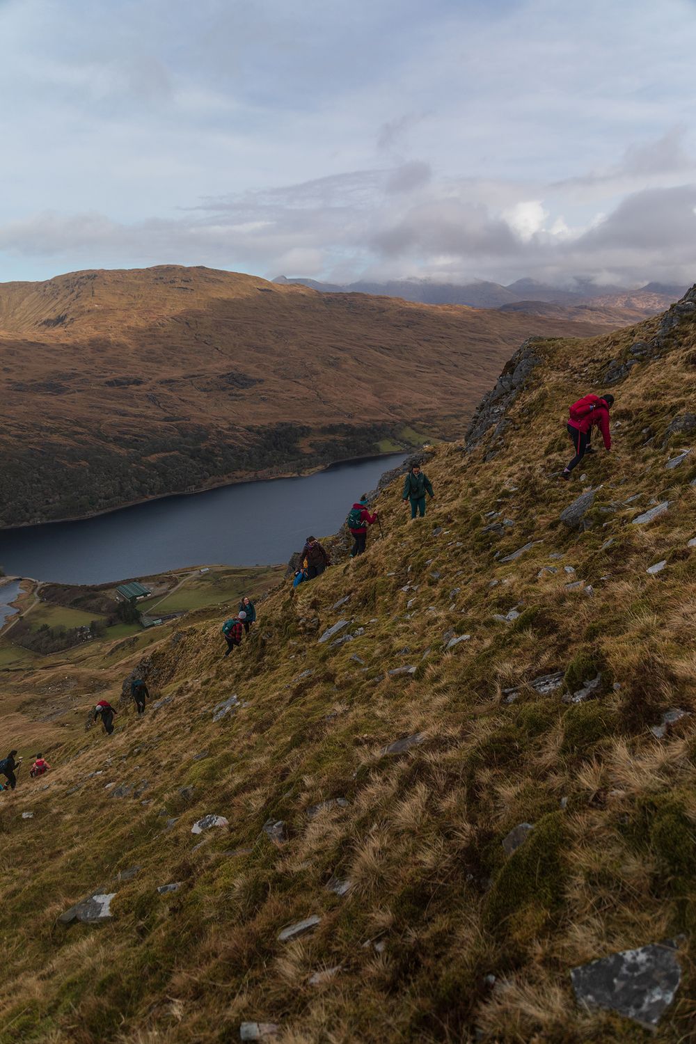 a group of woman hiking Ben Baun in Connemara national park on women day in March 8