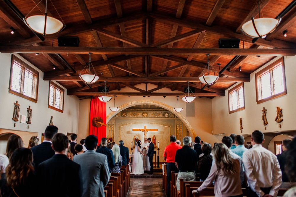 Bride and groom at st francis catholic church