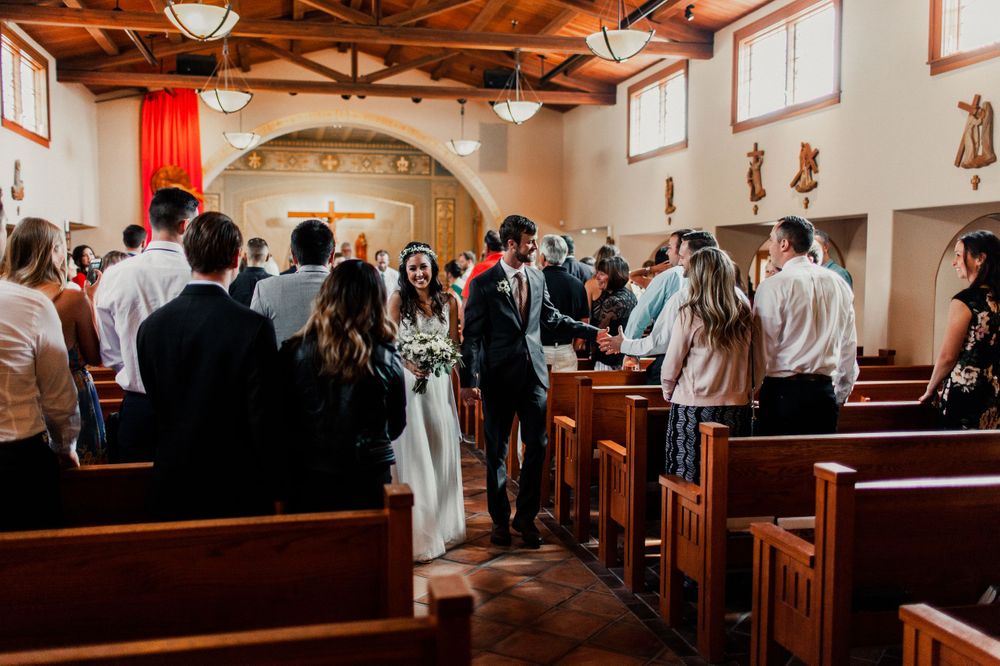 bride and groom walking down the aisle