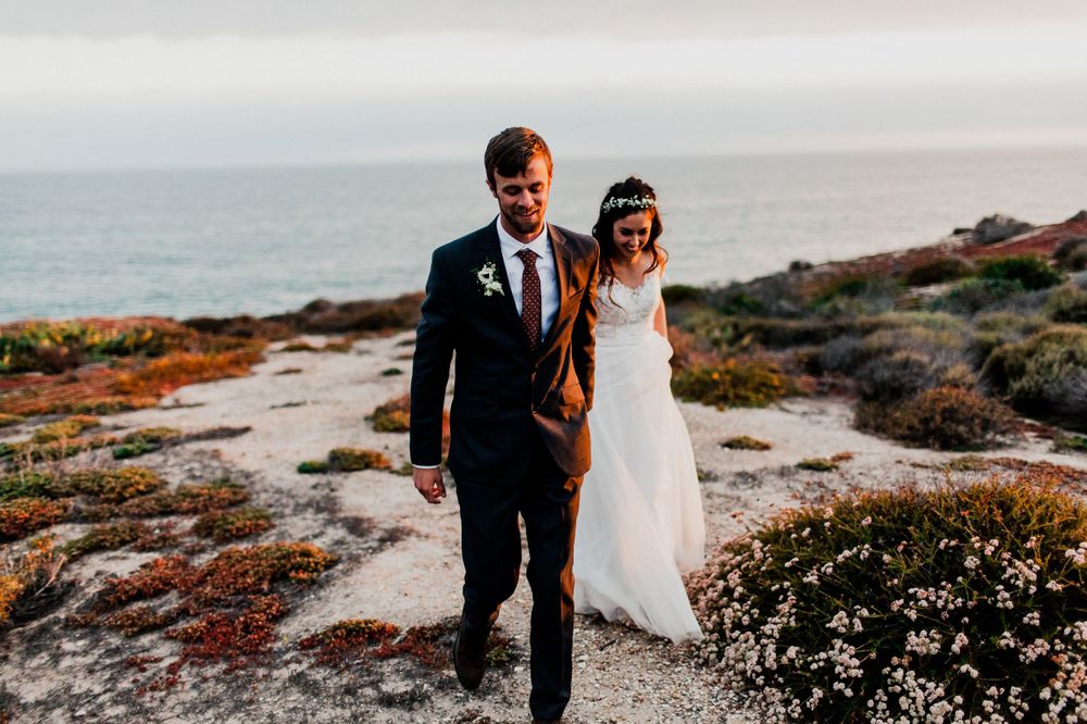 bride and groom walking towards camera