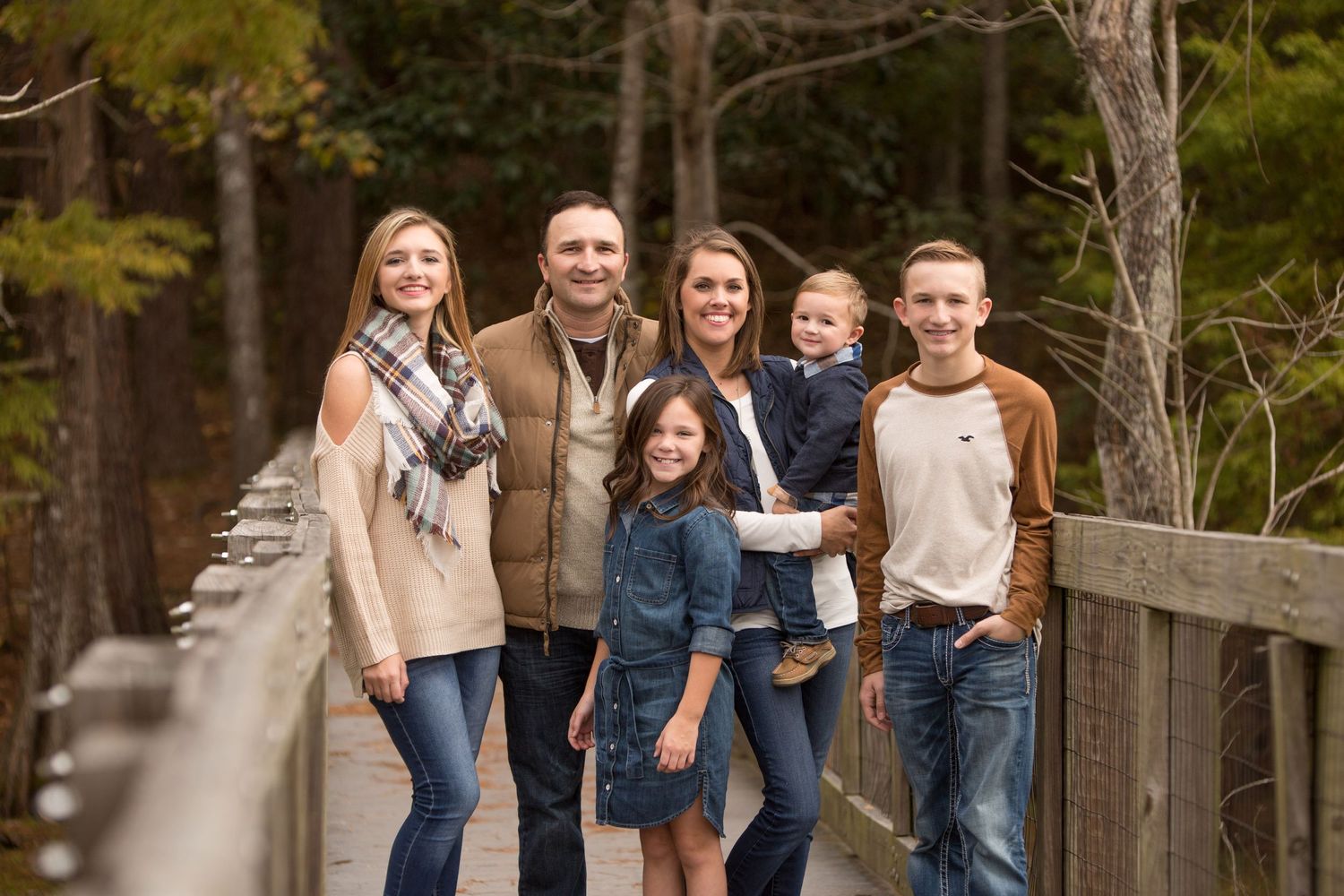Outdoor family fall portrait photo.