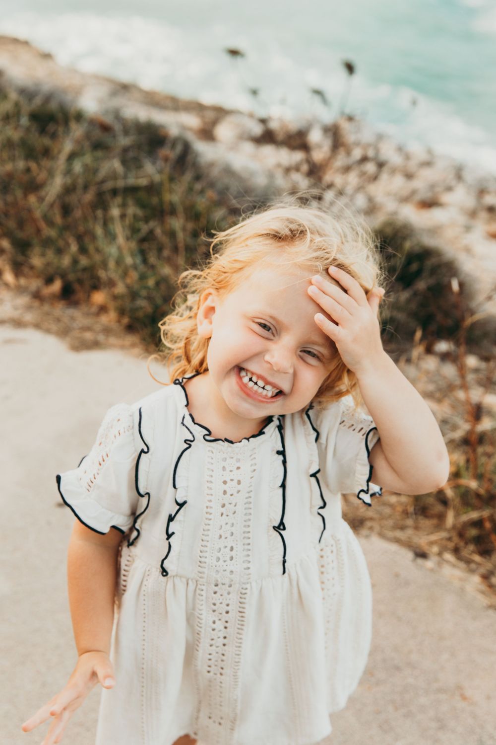 Cute family shoot on the beach in Mallorca, happiness, movement, love and joy