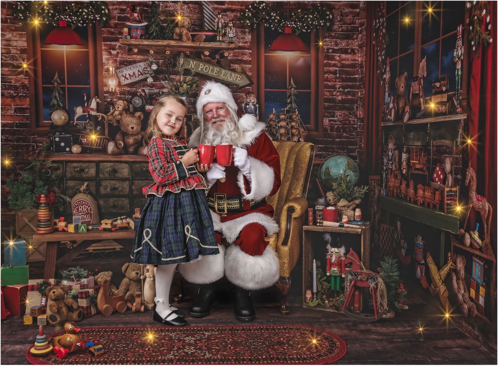 Santa standing with child during holiday portrait session in decorated festive set in Austin studio