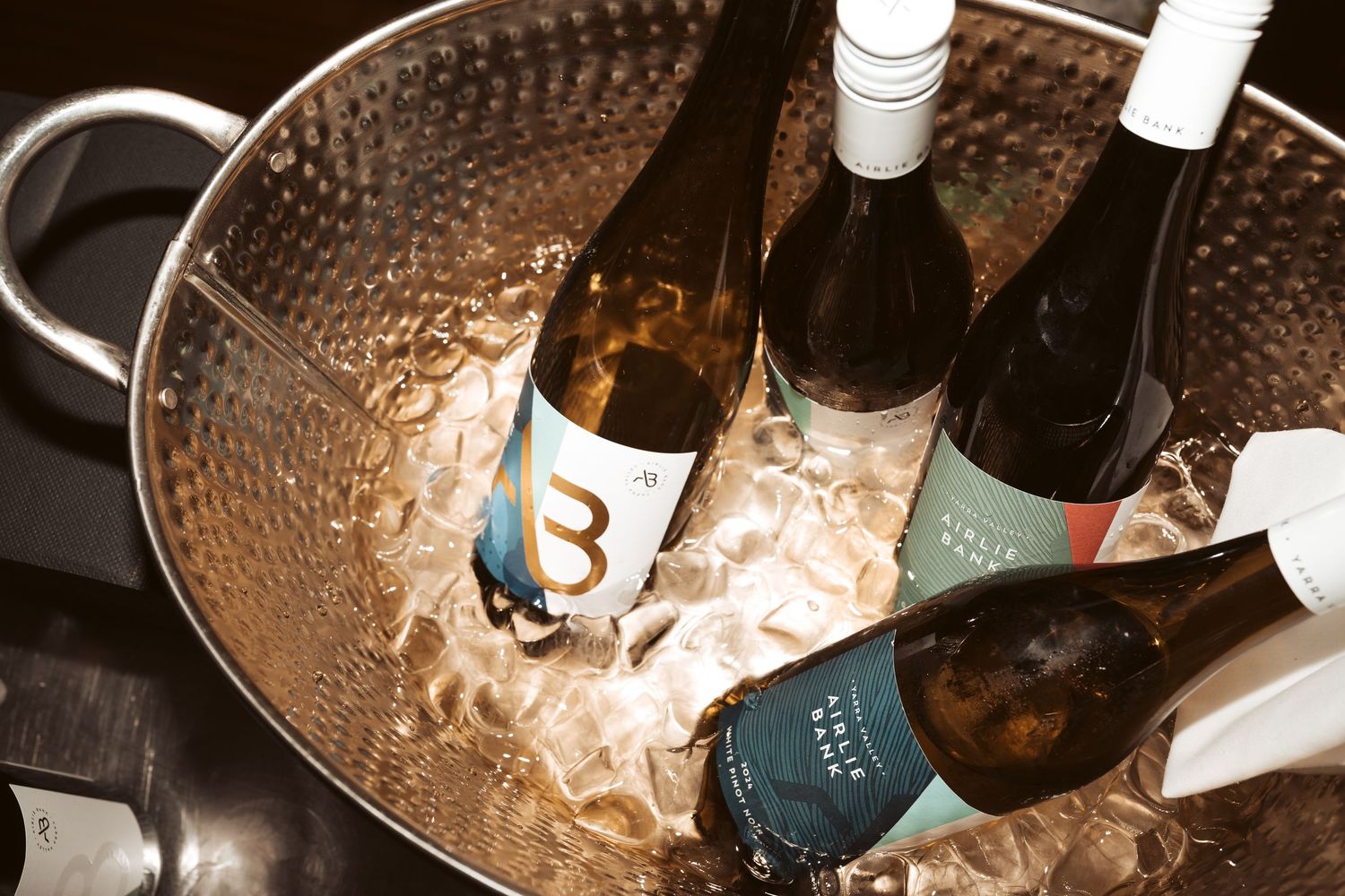wine bottles in an ice bucket