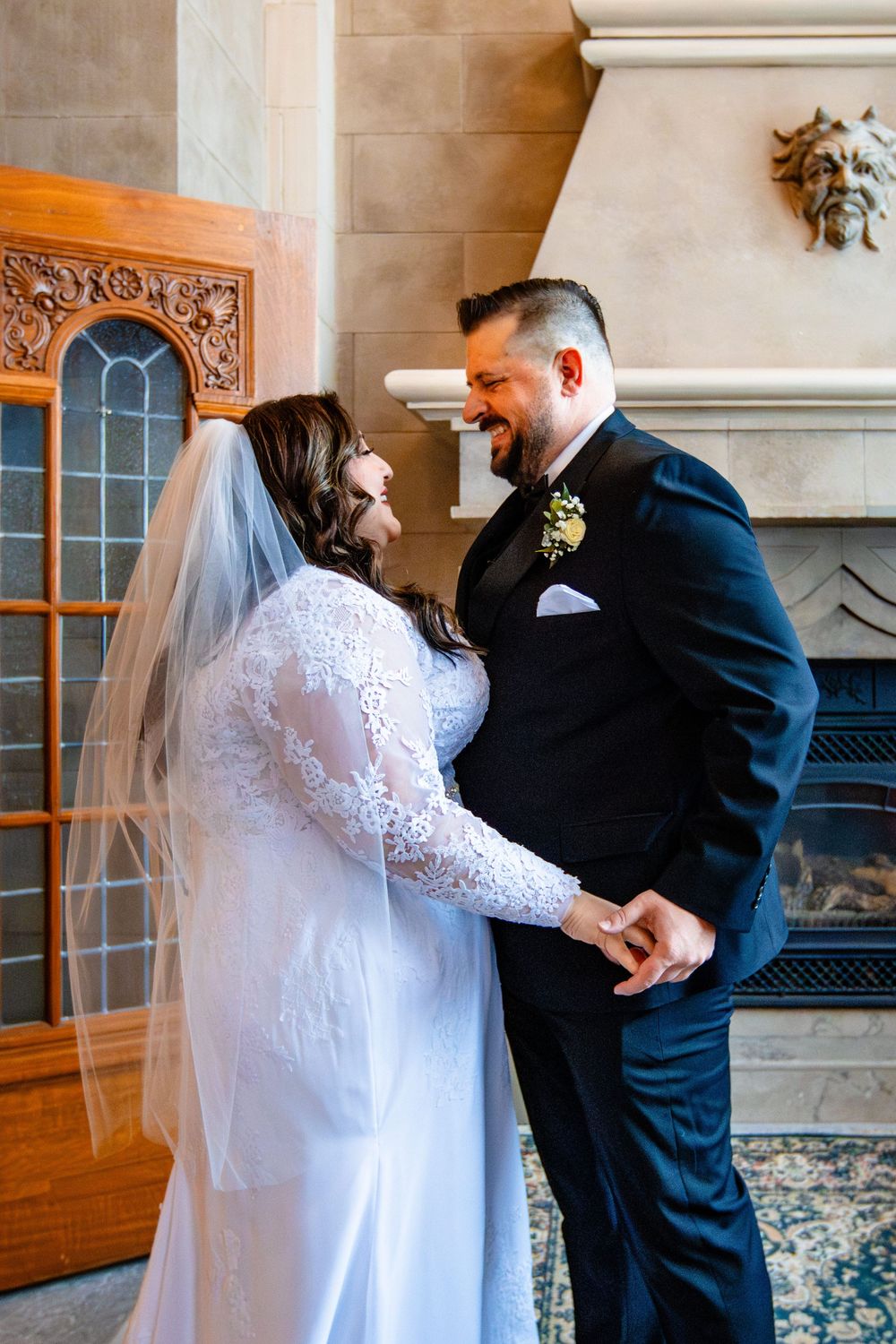 A couple shares a heartwarming first look moment at their wedding before the ceremony.