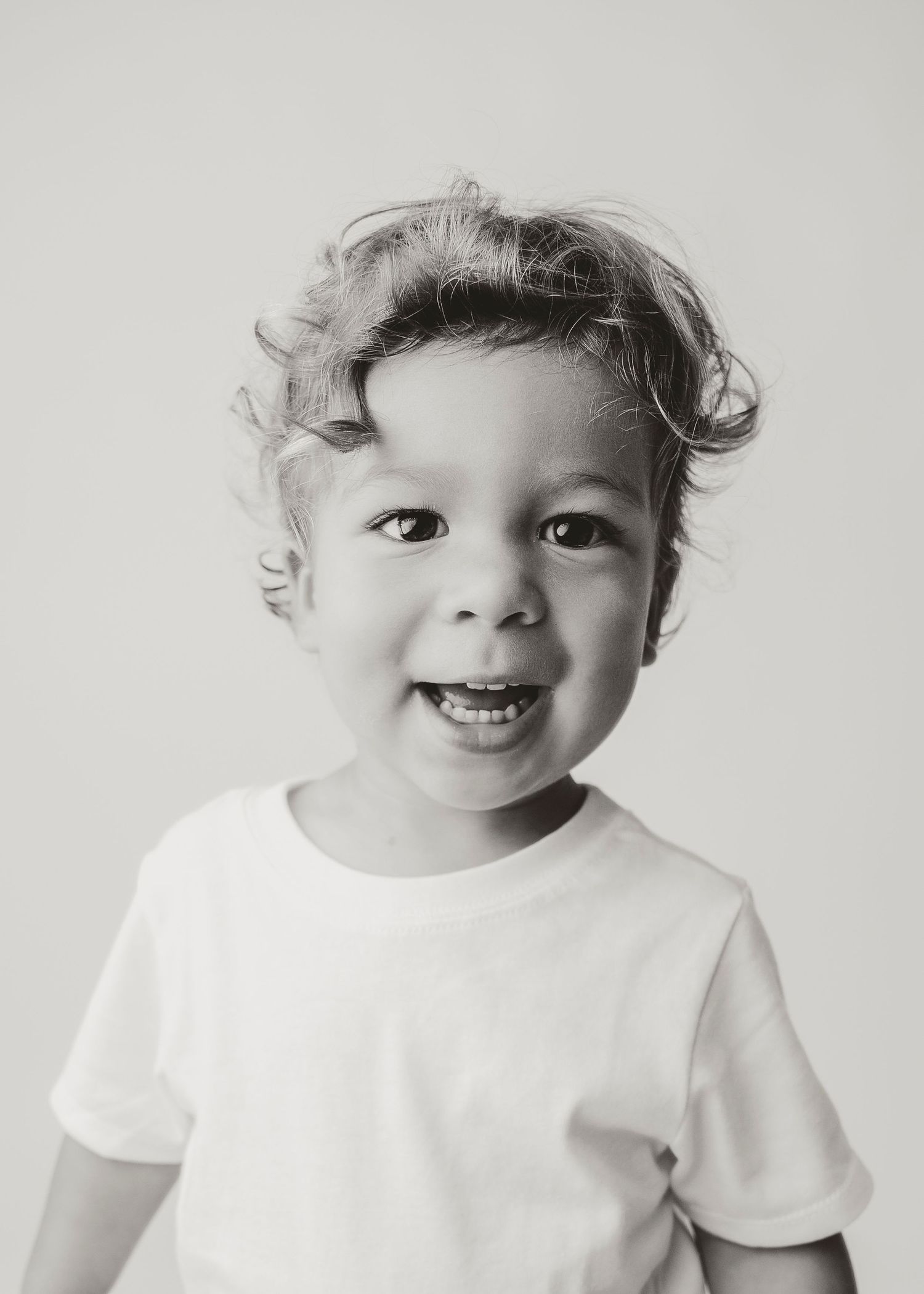 Child personality portrait session in Houston, TX capturing playful expressions, natural light, and authentic childhood moments.