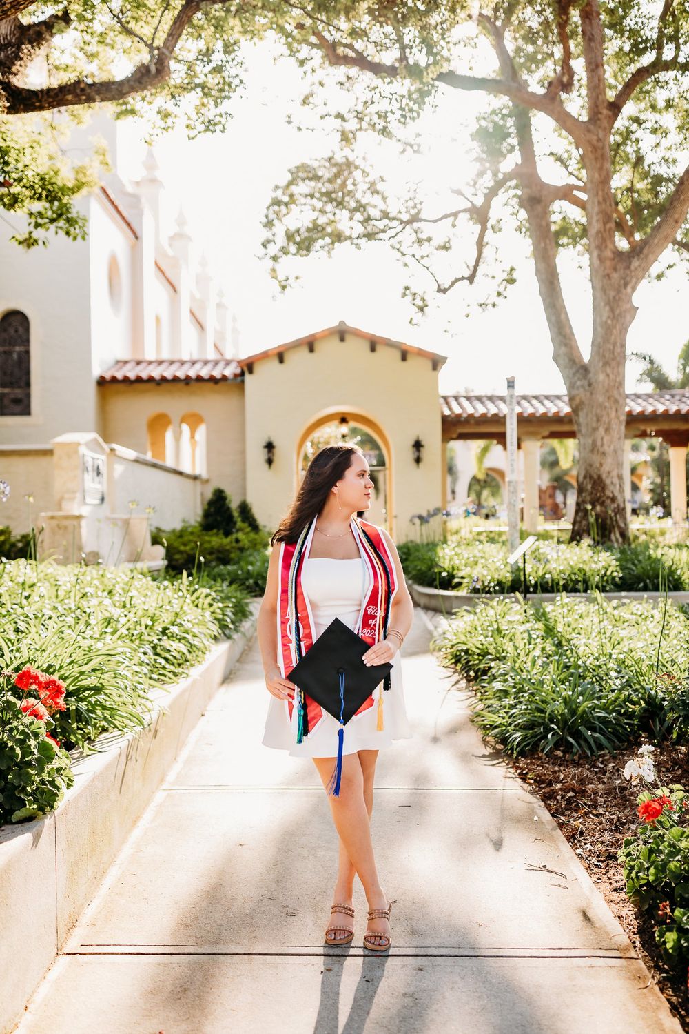 Three photos showing walking paths lined with lush green bushes and trees near Spanish-style buildings on a sunny day.