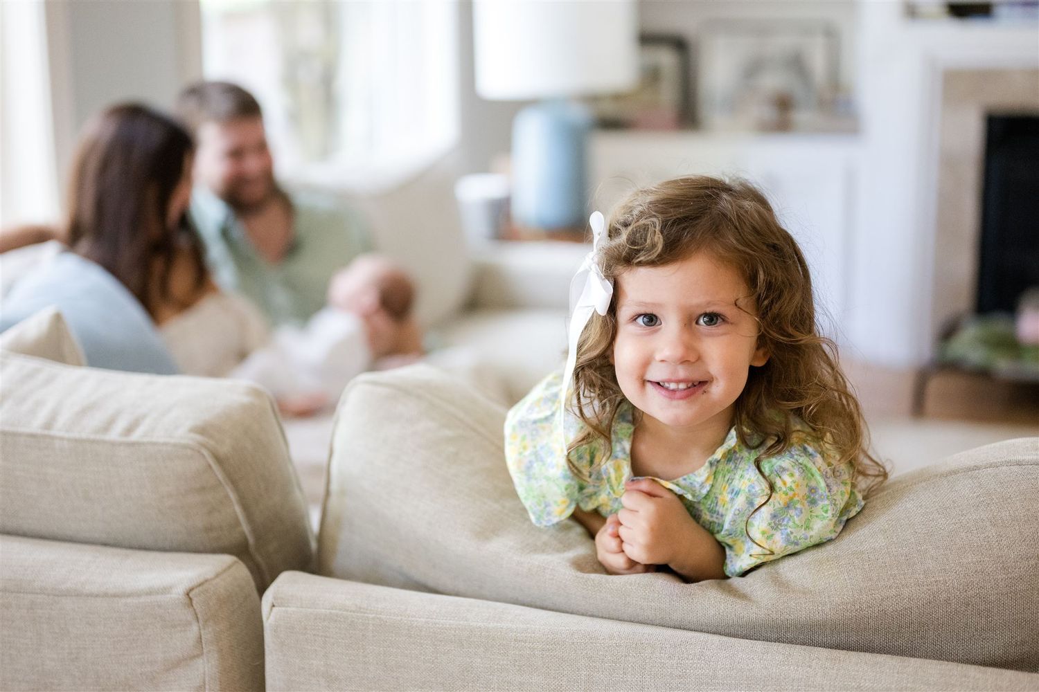 A series of warm, candid lifestyle photos showing moments of connection and contentment in bright, airy home settings.