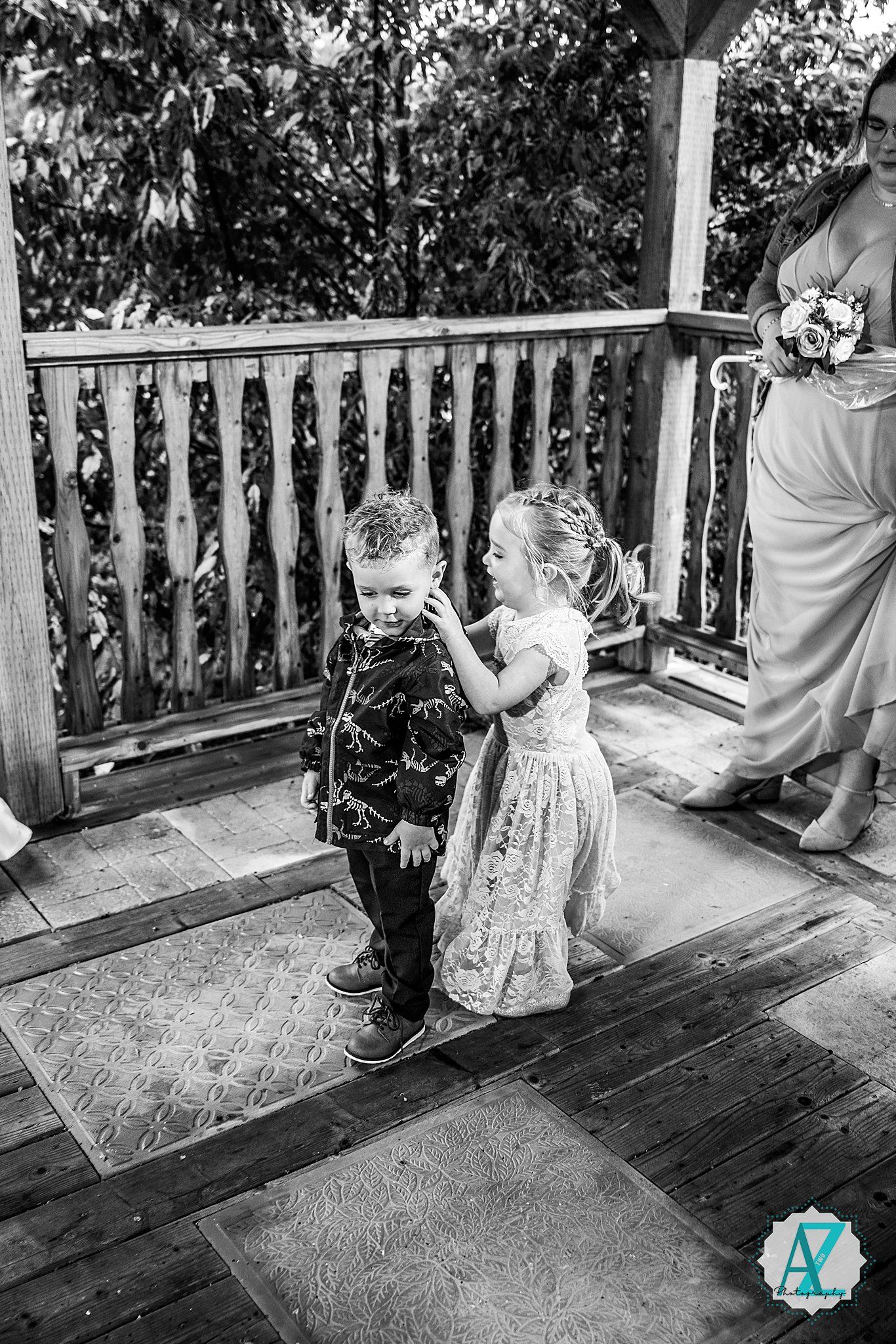 Black and white sequence of wedding photography in front of a wooden railing on a porch.