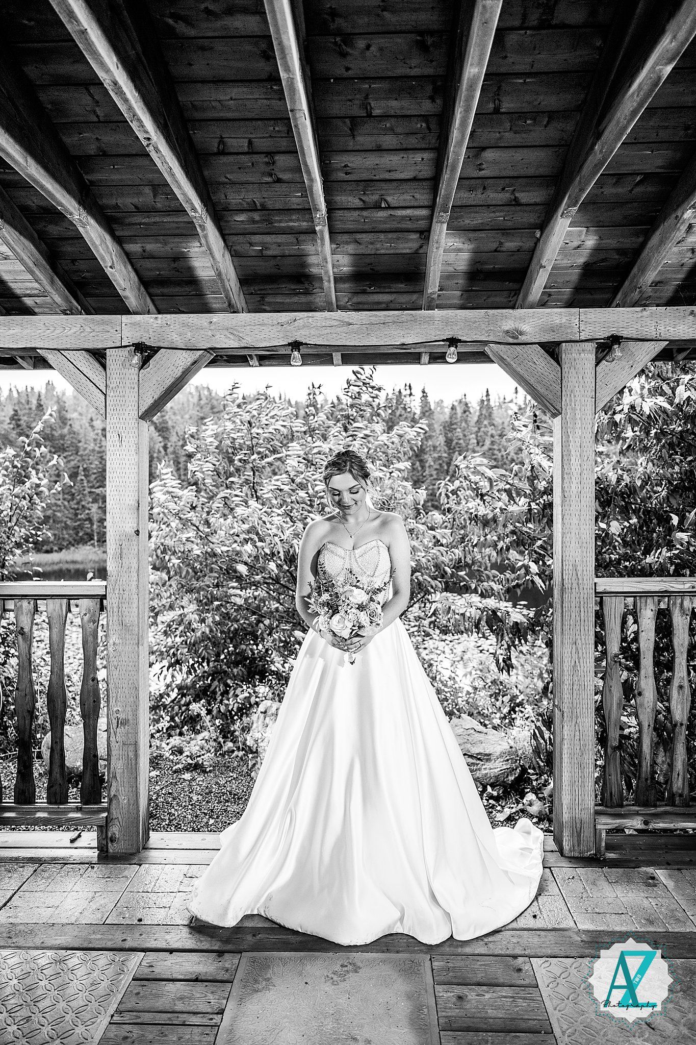 A sequence of four black and white wedding dress photos showing the back of a gown under a wooden gazebo.