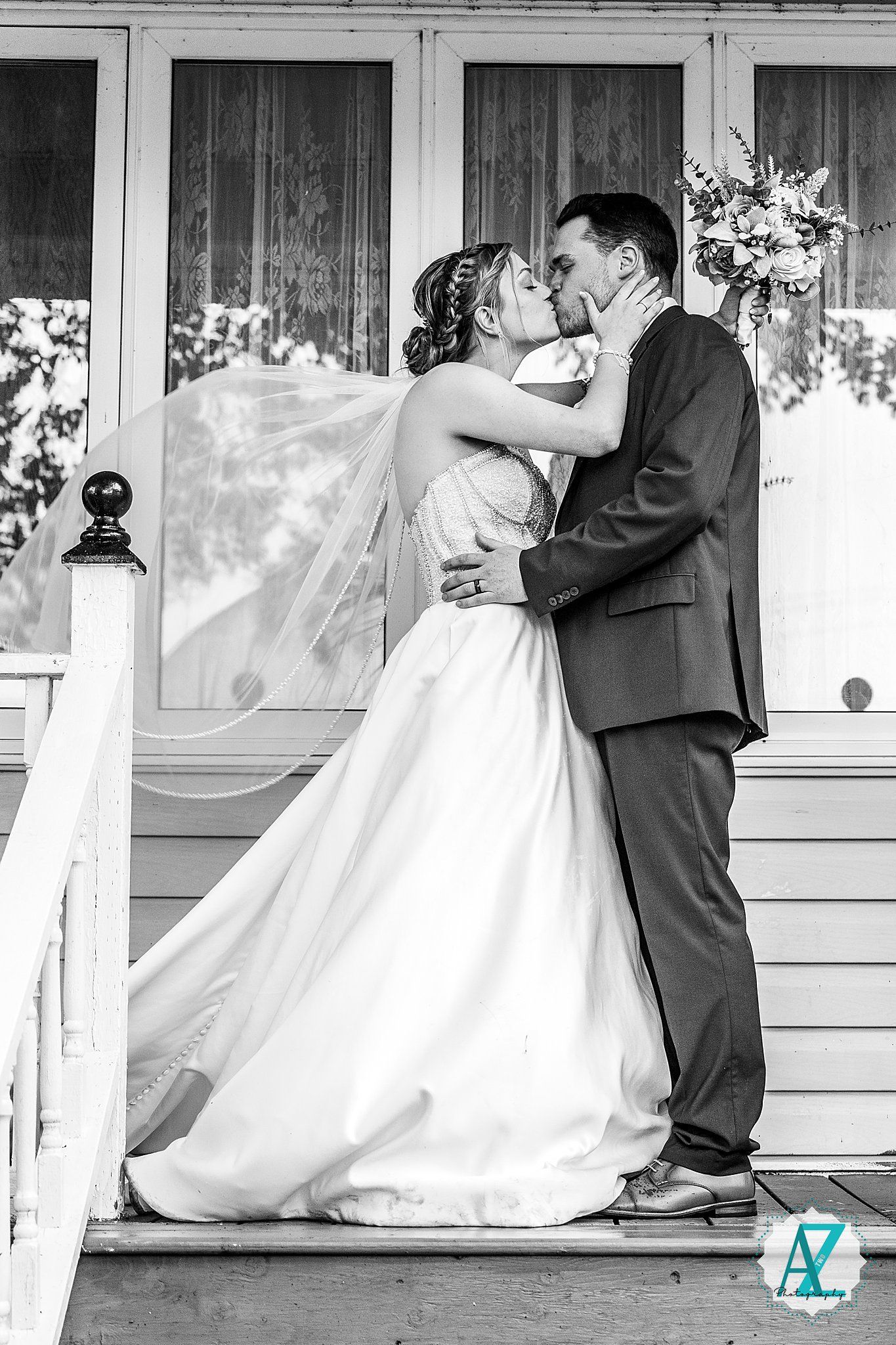 Wedding sequence in black and white showing couple's romantic poses on a wraparound porch.