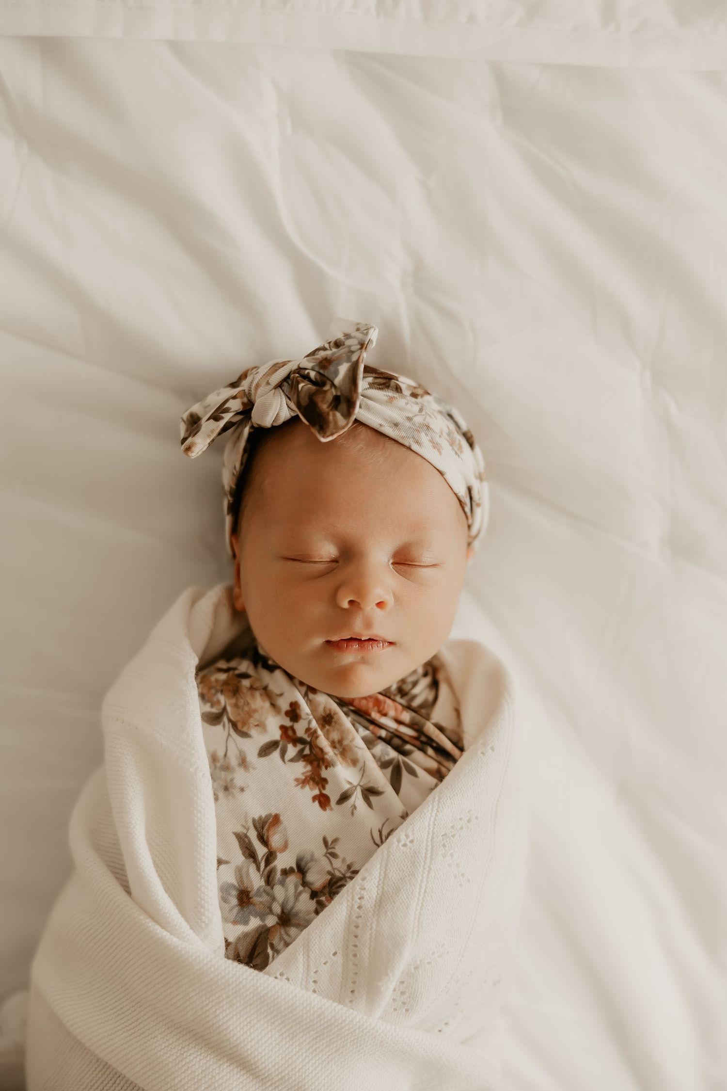A baby sleeps during a Honolulu Newborn Session.