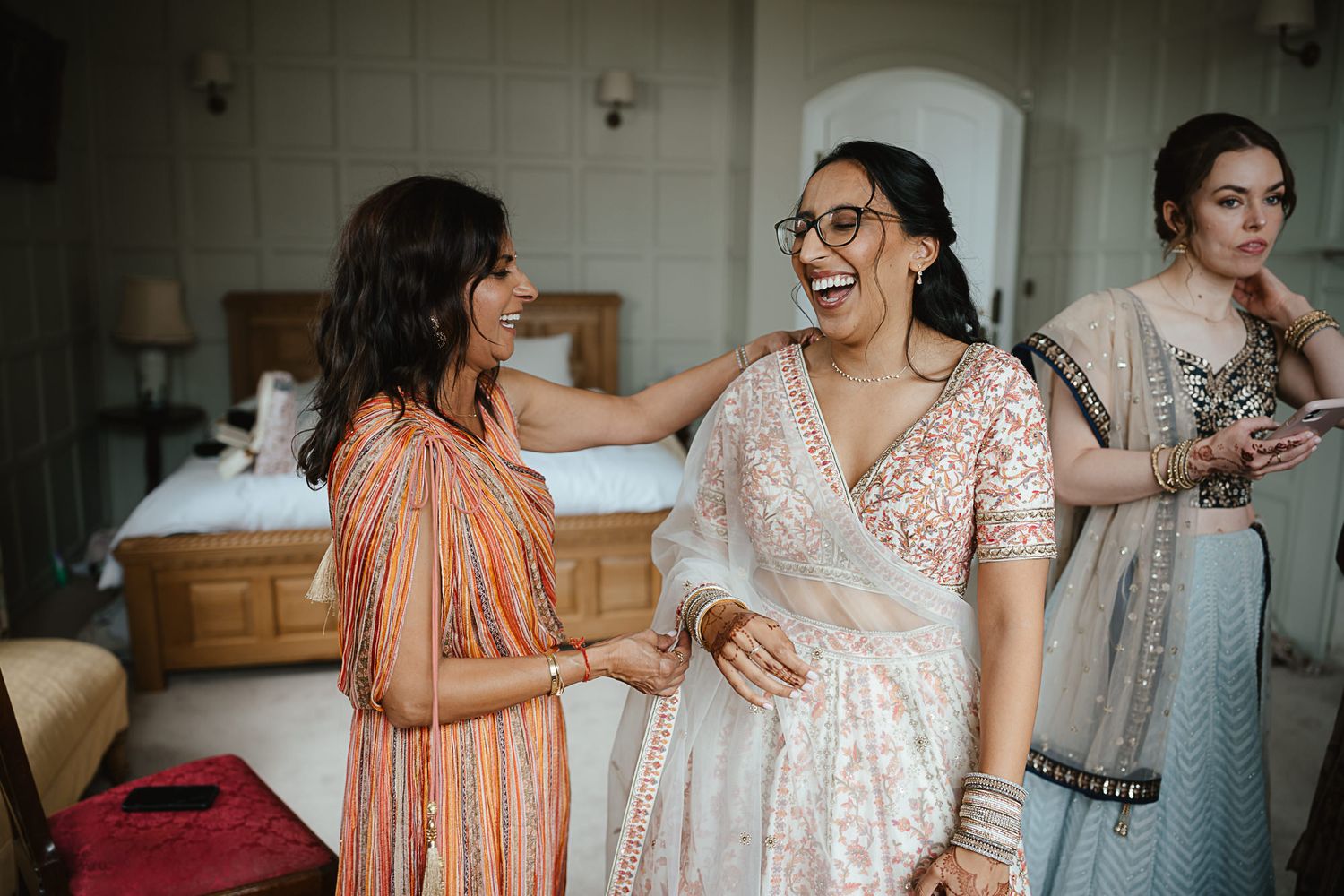 A joyful wedding day celebration captured in a series of candid moments with the bride and her loved ones.