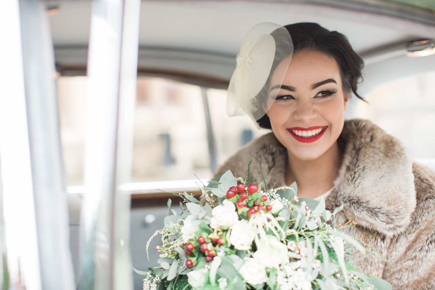 Nova Scotia wedding photographer captures bride in snowy outdoor portrait.