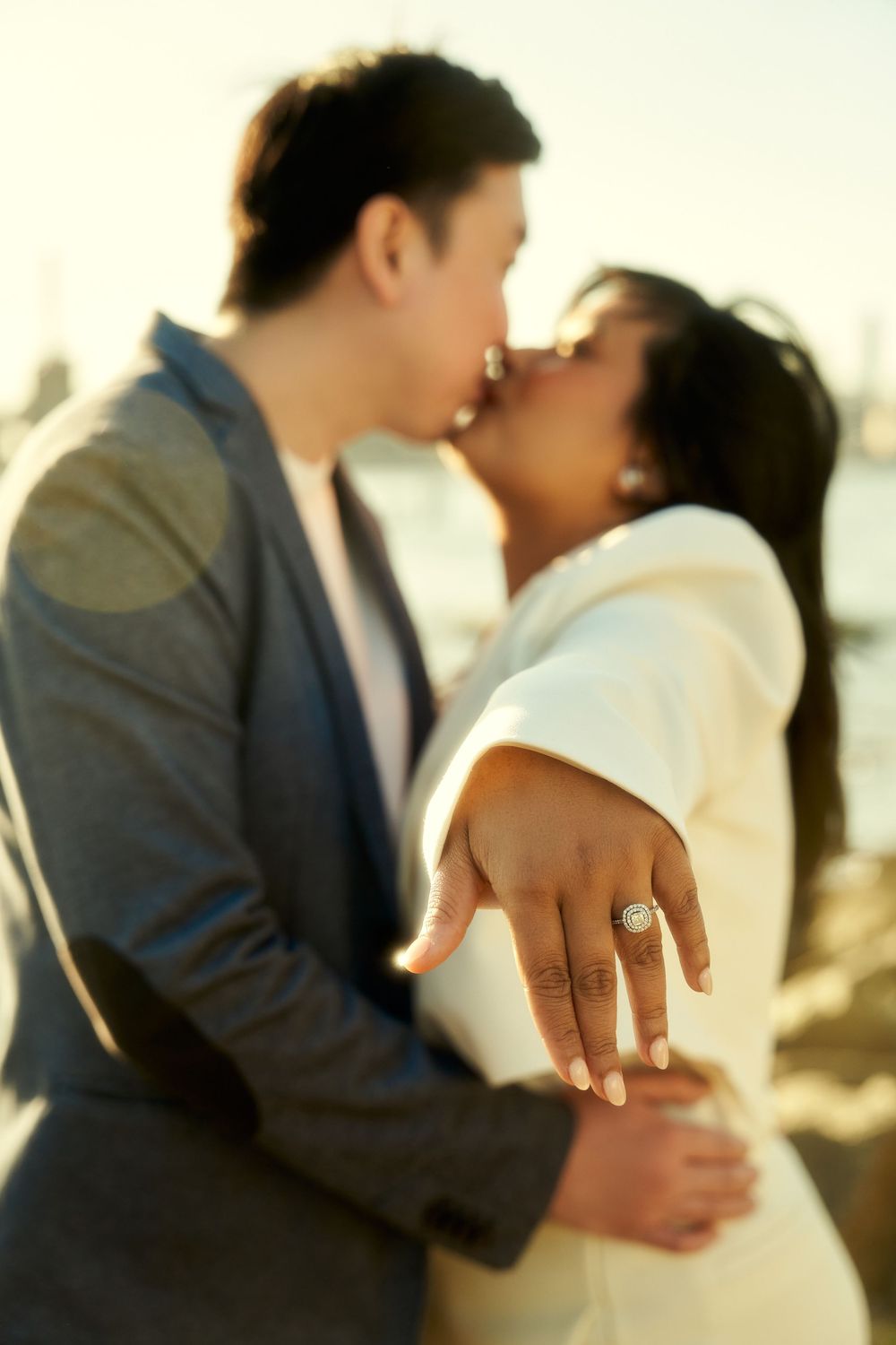 Romantic close-up sequence showing couple embracing and hands holding together in soft natural light. Engagement  in Williamsburge