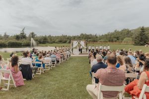 Outdoor summer wedding ceremony at Whispering Willow. Bright and airy timeless wedding photography Moncton wedding photographer packages