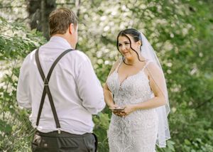 Bride and groom read personal vows before their wedding ceremony at Whispering Willow in Scoudouc New Brunswick, Moncton wedding photography