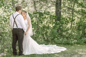 Bride and groom share first look at Whispering Willow in New Brunswick, Canada. Summer bright and airy timeless wedding, intimate moment