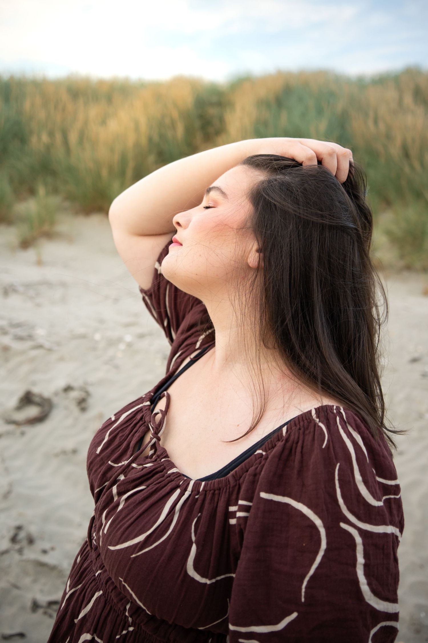 Empowered woman at the beach