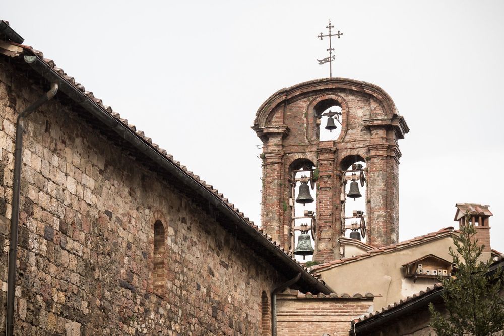 Stone church facades and bell towers showcase traditional Croatian coastal architecture and historic religious buildings.